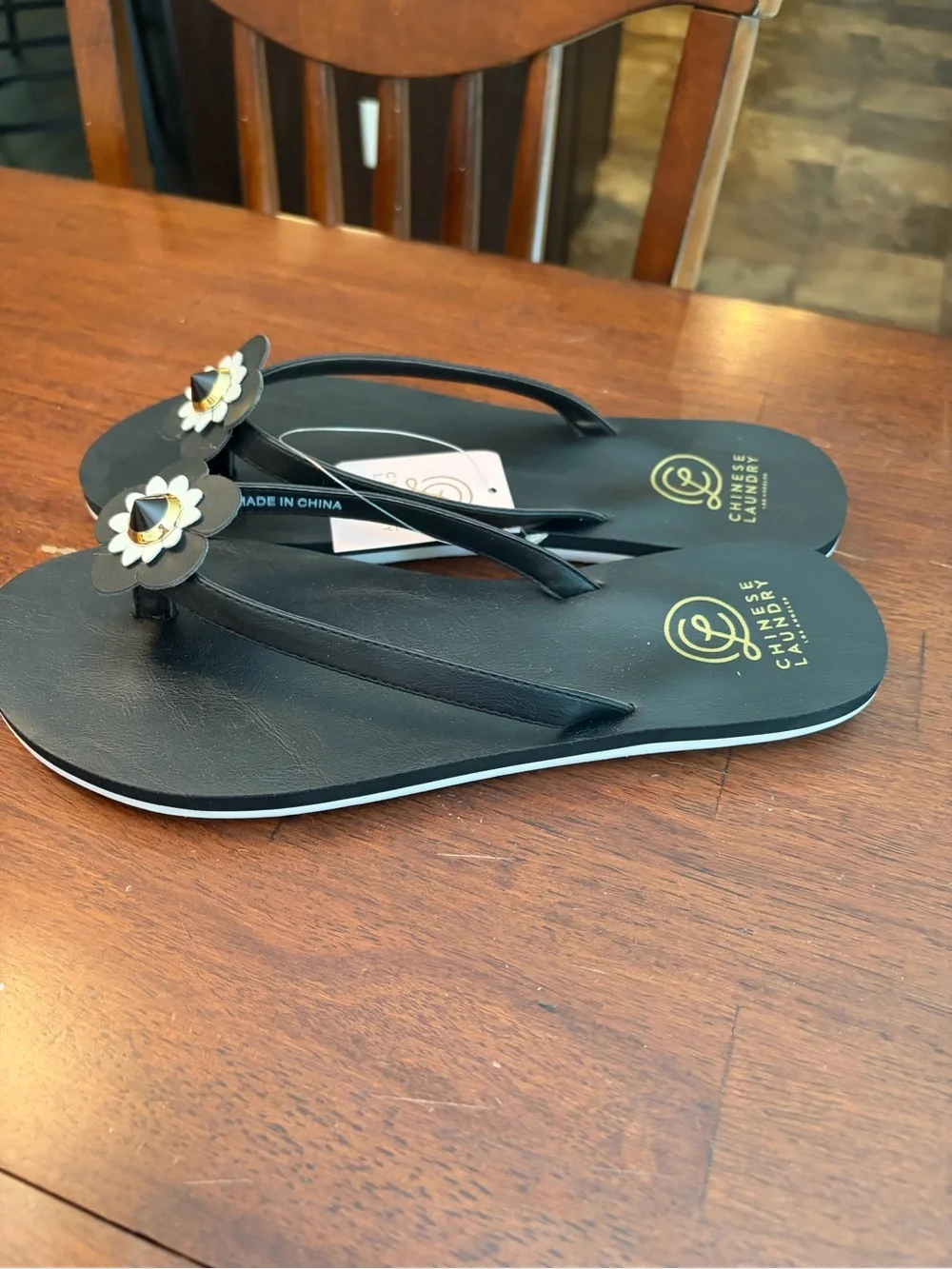 Chinese Laundry Black Floral Toe-Post Sandals with Gold Accent